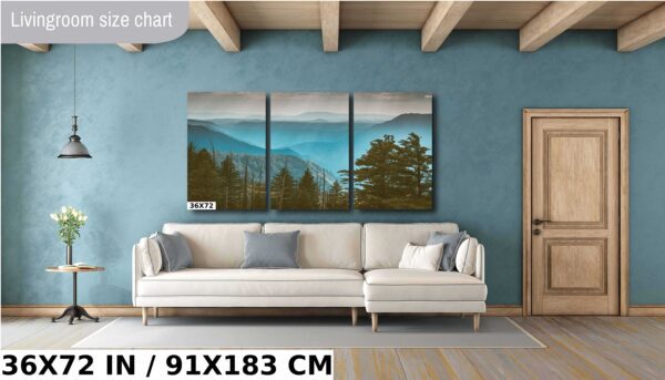 A living room with a couch and a wall hanging