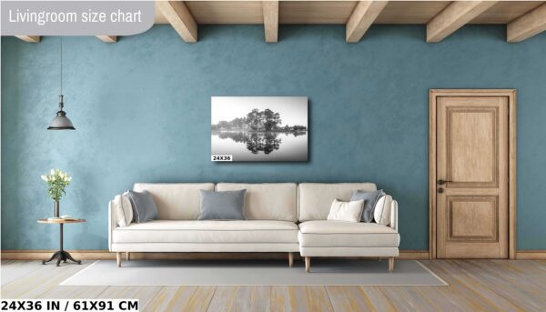 A living room with blue walls and white furniture.