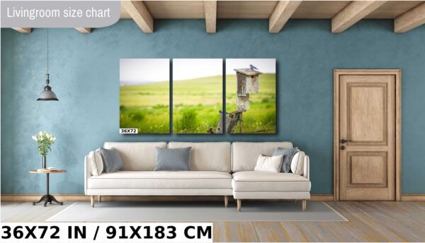 A large living room with a couch and a sofa