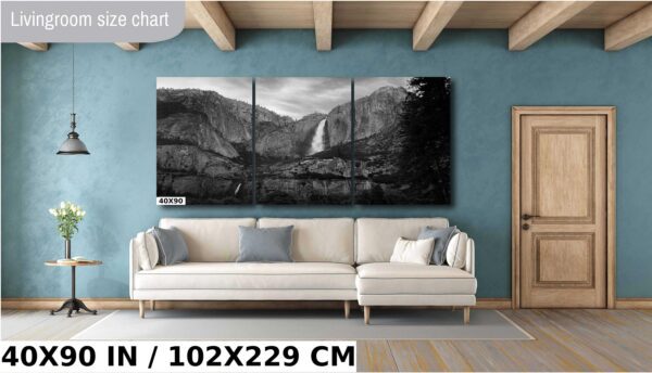 A large picture of a waterfall in the mountains
