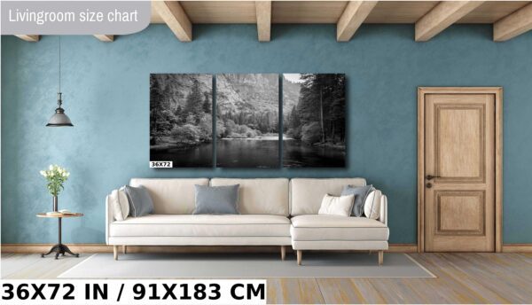 A living room with a couch and a sofa