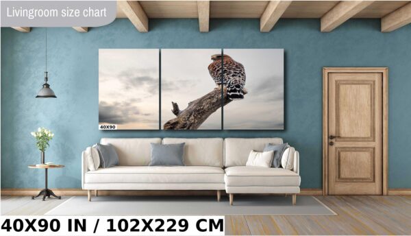 A large owl sitting on top of a tree branch.