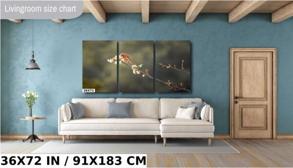 A living room with a couch and a wall hanging