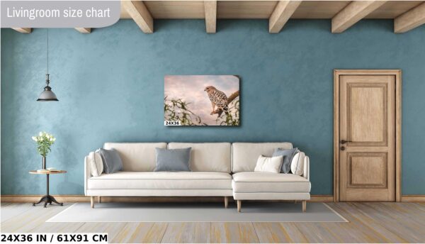 A living room with a couch and a painting on the wall