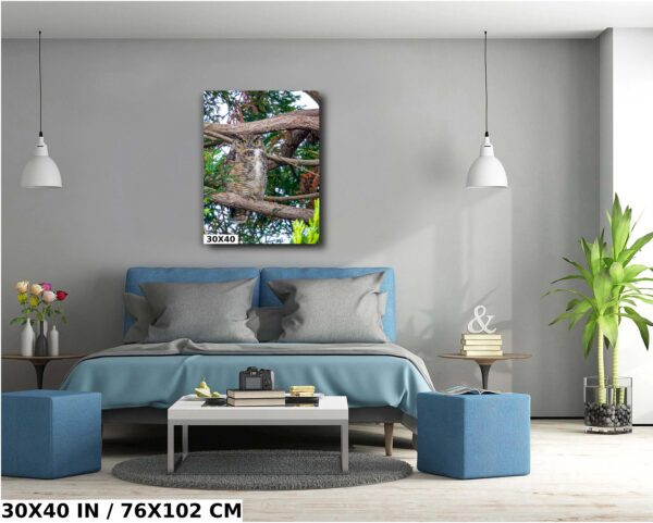 A bedroom with a bed and two blue tables