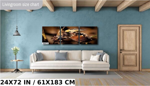 A living room with a couch and a wall hanging
