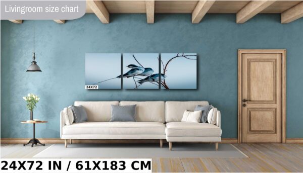A living room with a couch and a wall hanging
