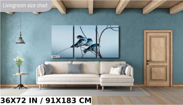 A large picture of two birds sitting on a branch.