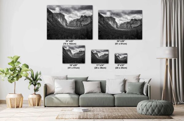 A couch with pillows and two pictures on it