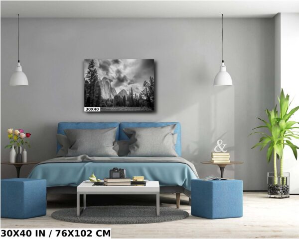 A bedroom with a blue bed and gray walls