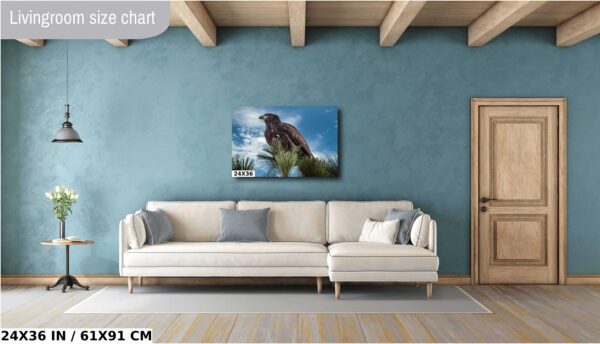 A living room with a couch and a painting on the wall
