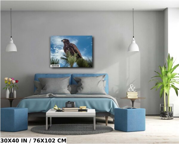 A bedroom with a bed and two blue tables