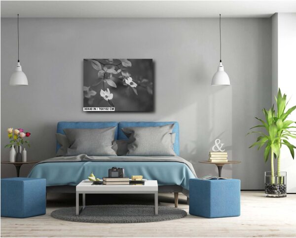A bedroom with a blue bed and white walls