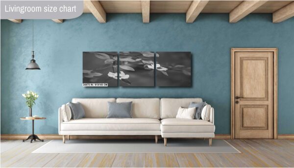 A living room with blue walls and white furniture.