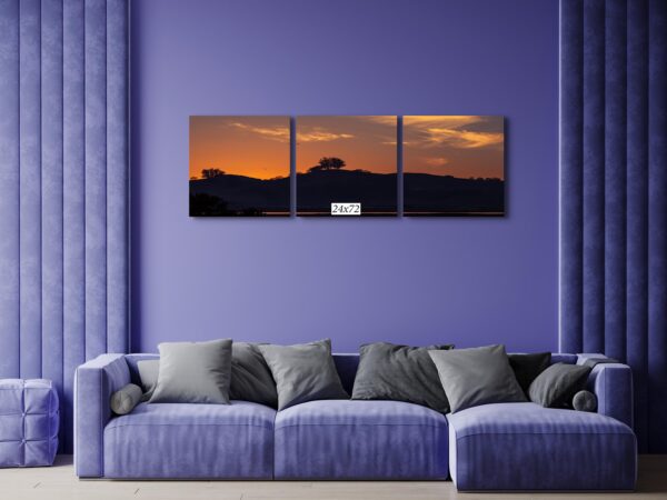 A living room with purple walls and a couch