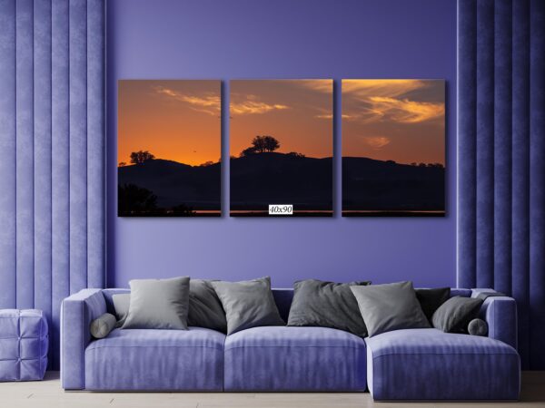 A living room with purple walls and a couch