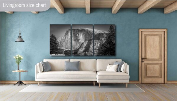 A living room with a couch and a wall hanging