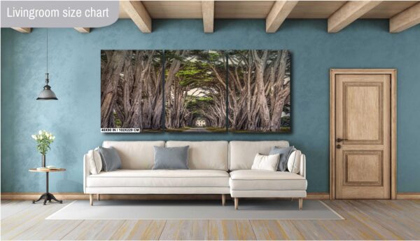 A couch and wall hanging in a room.