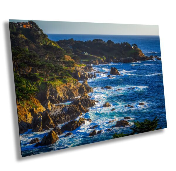 A painting of the ocean and cliffs