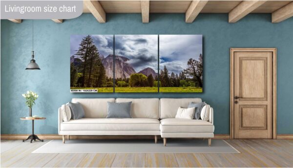 A living room with a couch and a wall hanging