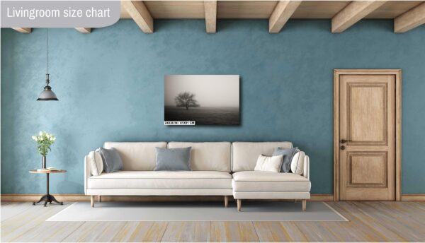 A white couch and blue wall in a room.