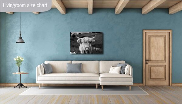 A living room with blue walls and white couch