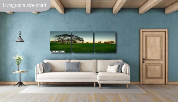 A living room with a couch and a wall hanging