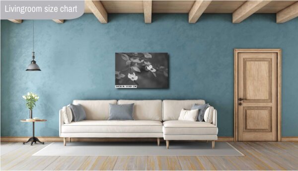 A living room with blue walls and white furniture.