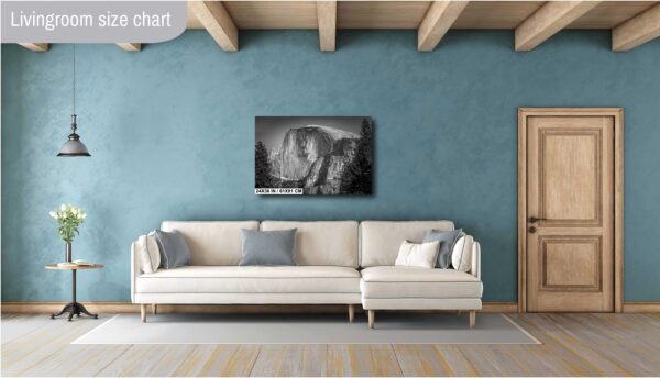 A white couch sitting in front of a blue wall.