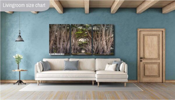 A couch and wall hanging in a room.
