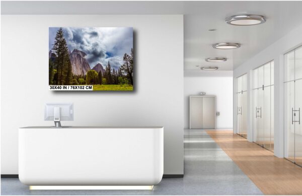 A bathroom with a large painting on the wall