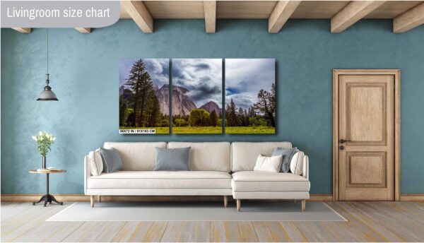 A living room with a couch and a wall hanging