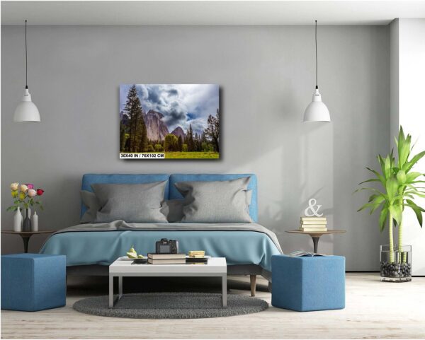 A bedroom with a blue bed and grey walls
