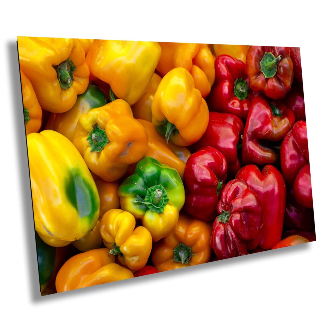 A close up of peppers on display at the market
