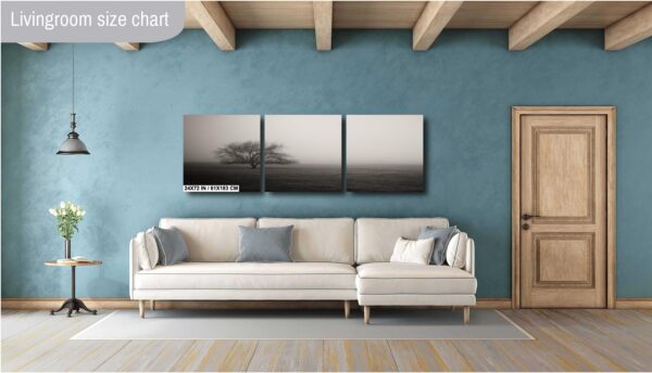 A living room with blue walls and white furniture.