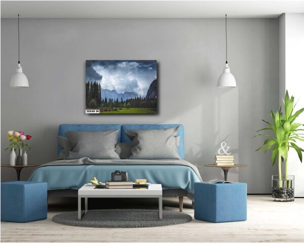 A bedroom with a bed and two tables