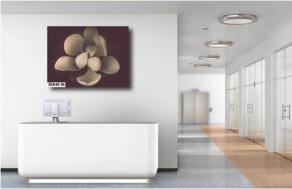 A white bathroom with a large flower picture on the wall.