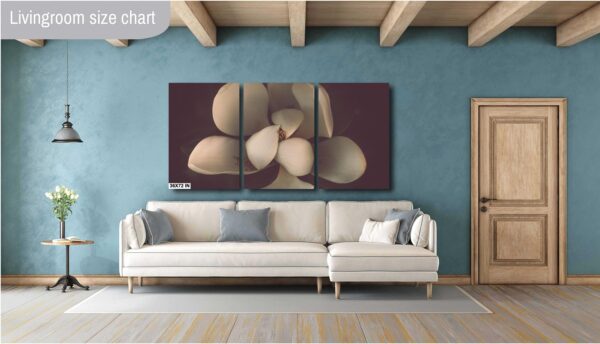 A living room with a couch and a wall hanging