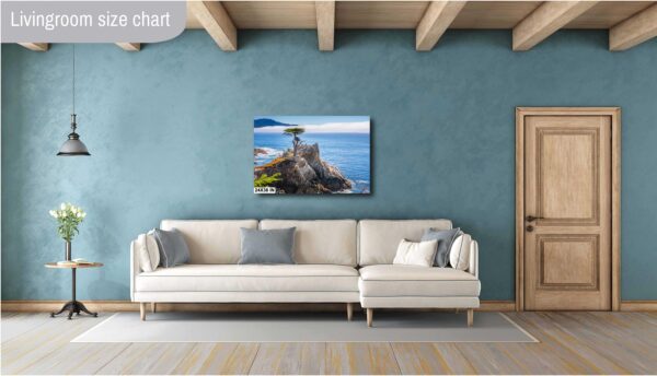 A living room with a couch and a painting on the wall