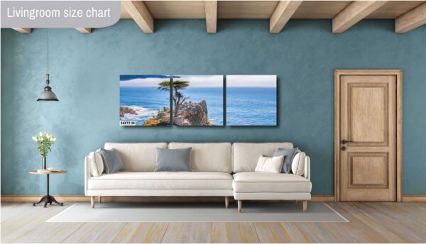 A living room with a couch and a wall hanging