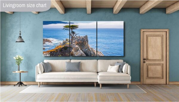 A living room with a couch and a large painting