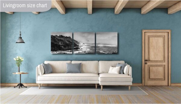 A living room with a couch and a wall hanging