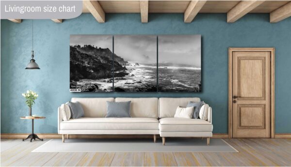 A living room with a couch and a wall hanging