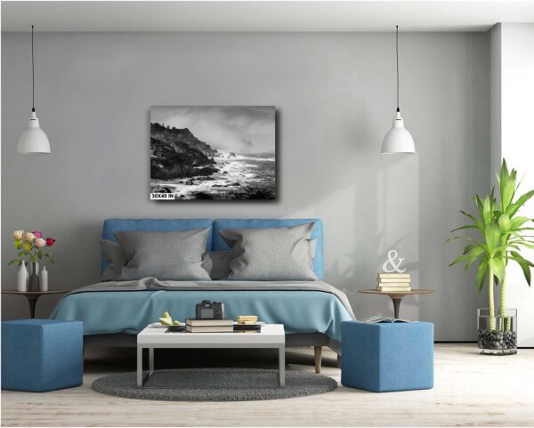 A bedroom with a bed and two tables