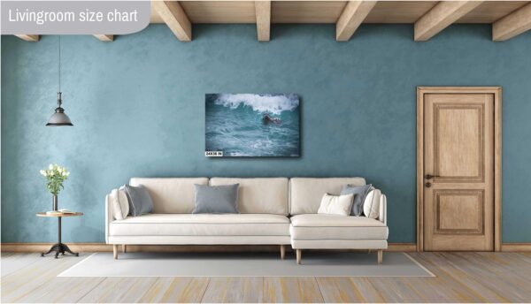 A living room with a couch and a painting on the wall