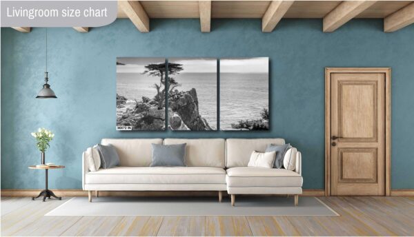 A living room with a couch and a wall hanging