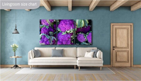 A living room with two large purple flowers on the wall