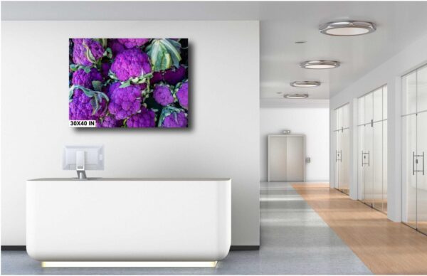 A white bathroom with purple flowers on the wall