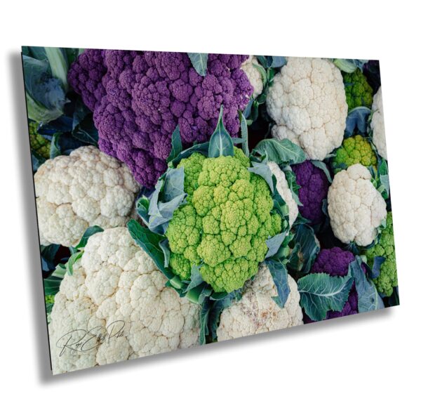 A bunch of cauliflower is in the middle of each other