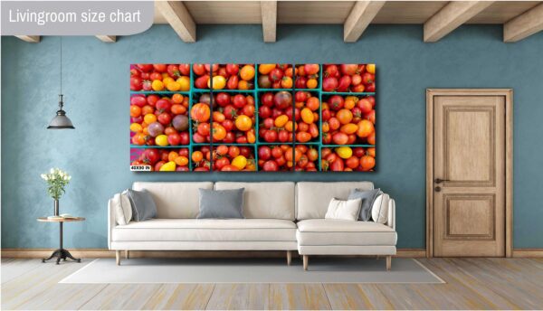 A living room with a couch and a wall of fruit.